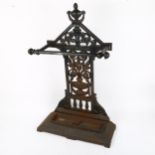 A Victorian Aesthetic Movement cast-iron stick stand, in the manner of Christopher Dresser, with