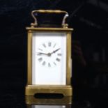 A brass-cased carriage clock, case height 11cm, working order, no key