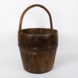 A coopered oak bucket, height 54cm