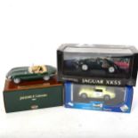 Various model cars, including Burago Jaguar E Cabriolet, and reproduction Rolls Royce Spirit of