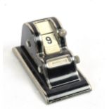 An early 20th century German perpetual desk calendar, length 10cm