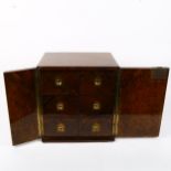 A good quality campaign burr-walnut table-top cabinet of drawers, with recessed brass handles, and 6