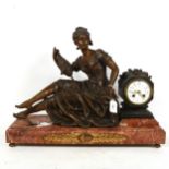A large Art Nouveau figural spelter and pink marble mantel clock, by Itsweire-Tournade of