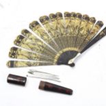 A 19th century gilded and lacquered fan, length 15cm, and a 19th century surgeon's set in original