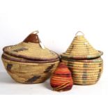 A graduated set of 3 woven wicker baskets