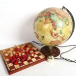 A 12" illuminated globe on stand, and a chess set with box