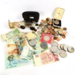 Various world coins and banknotes, including Turkmenistan, Elizabeth II crowns, Second World War