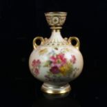 A Royal Worcester porcelain vase, hand painted and gilded floral decoration, model 1109, height 23cm