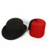 A Gauntic bowler hat, and a red Fez