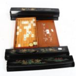 A cased Mahjong set, and a set of painted and gilded lacquered walls