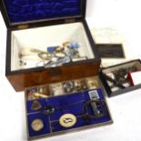 An Antique silver moat spoon, a steel buckle, a cast-ivory brooch etc, in a walnut jewel box