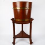 R A Lister & Co Limited coopered oak jardiniere on stand, overall height 71cm