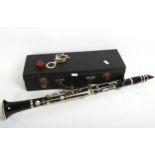 A Hawkes & Son Excelsior Sonorous Class 4-section ebony clarinet, serial no. 10582, in hardshell