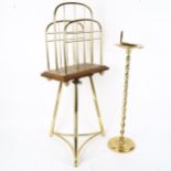 An Edwardian brass oak and cast-iron revolving magazine rack, by Hall & Son, and a Victorian brass