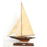 A model J class yacht 'Britannia' on stand, length overall 38cm