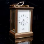 An Imperial brass-cased carriage clock, by Fema, case height 11.5cm, working order, with key