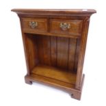 A small modern oak bookcase, with 2 frieze drawers and open shelves under, on bracket feet, W61cm,