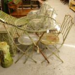 A folding metal circular-top garden table, and a pair of matching folding chairs