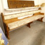 A stained oak church pew, L242cm, H92cm