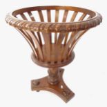 A reproduction Empire style jardiniere on platform base, H65cm