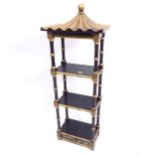 A pagoda style ebonised and gilded table-top open bookcase of small size, with 3 shelves and short