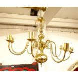 A Dutch style brass 8-branch chandelier