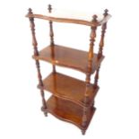 A Victorian mahogany 4-tiered whatnot on turned supports, W56cm, H117cm, D31cm