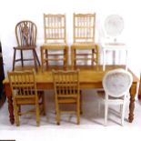 A large pine farmhouse kitchen table, with baluster turned legs, together with a set of 4 spindle-