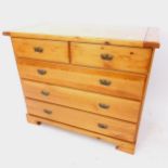 A modern pine-fronted chest of 4 long drawers, on bracket feet, W105cm, H86cm, D50cm