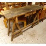 A Vintage stained pine work bench, with single drawer, L152cm, H95cm, D56cm