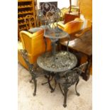A green painted metal circular garden table, W68cm, H64cm, and 3 chairs (4)