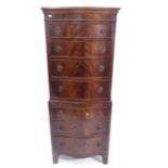 A reproduction mahogany serpentine-front chest on chest, W63cm, H159cm, D42cm