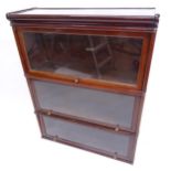 An early 20th century mahogany 3-section Globe-Wernicke bookcase, lacking base, W87cm, H112cm, D30cm