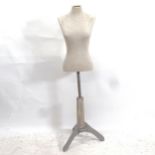 A 20th century half shop mannequin on stand, marked London Cannes, H155cm