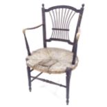 A 19th century armchair, designed by D.G. Rossetti by for Morris & Co