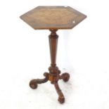 A 19th century crossbanded walnut lamp table on tripod base, W44cm, H71cm