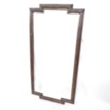 A brass picture/mirror frame of shaped form, with reeded barrel decoration, L153cm, W66cm