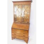 An Edwardian mahogany and satinwood-banded bureau bookcase, W100cm, H205cm, D48cm