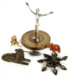 Various collectables, including a small brass sphynx, a chrome plated car mascot, an Archibald