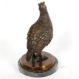 A bronzed resin figural grouse sculpture, unsigned, on veined black marble base, height 27cm