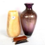 An amethyst and gilded Art glass vase, 369cm, and alabaster vase, and various pens