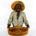 A large painted composition figural half length sculpture, figure with basket, height 70cm