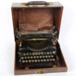 An early Bijou portable typewriter in case