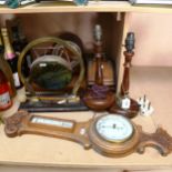 An oak barometer, a gong, height 31cm, oak table lamps, coal scuttle design cabinet, clock, and a