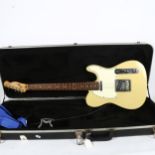 A cream Fender Squier electric guitar, in hardshell travel case