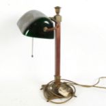 A brass and green glass swivel desk lamp, height 46cm (shade broken and re-glued)