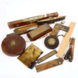 Brass-mounted spirit levels, surveyor's tapes, boxwood rules etc