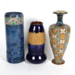 A Royal Doulton stoneware vase with tube-lined frieze, 24cm, and 2 smaller Doulton vases