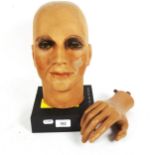 A hand painted composition mannequin head, by Sperling Models Ltd, and a mannequin hand