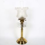An Antique oil lamp with brass column cut-glass font, height 63cm overall